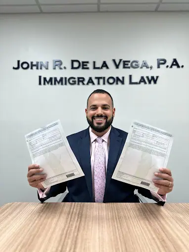 John de la Vega, Esq.
